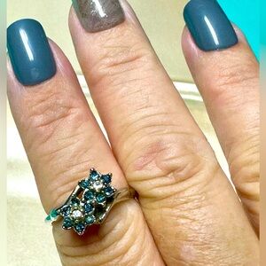 Unique estate piece sterling silver Tanzanite, and diamond ring